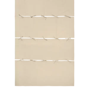 Link Modular Tablecloth in parchment, four sections joined with tie bows, seen from above