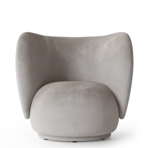 Rico Lounge Chair in concrete faded velvet with curved back and rounded seat