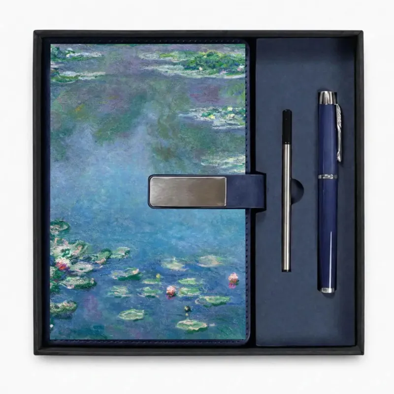 Blue Water Lilies 1906 notebook with Monet’s pond painting, coordinated metal pen and ink refill displayed in an open gift box